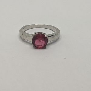 Ruby colored stone ring